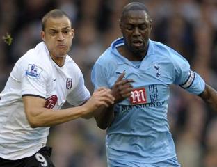 Bobby Zamora of Fulham and Ledley King of Tottenham Hotspur