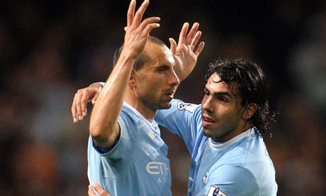 Manchester City's Martin Petrov & Carlos Tevez